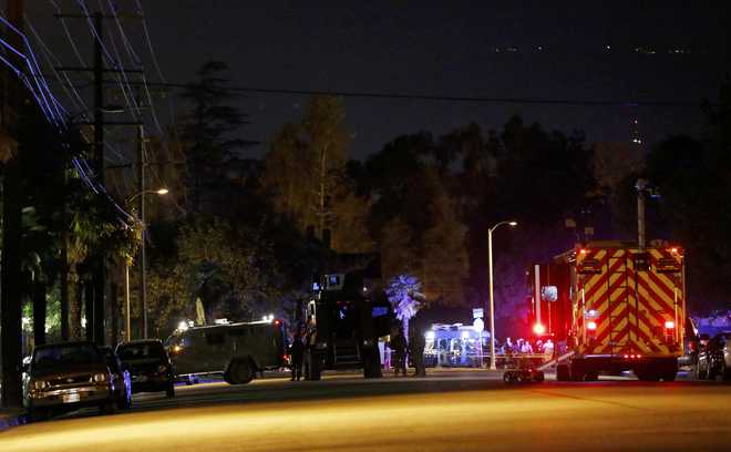Two suspects dead after 14 killed in shooting rampage in California