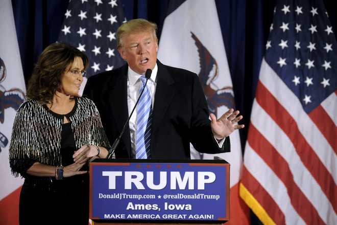 Trump wins Palin backing; Sanders rising against Clinton