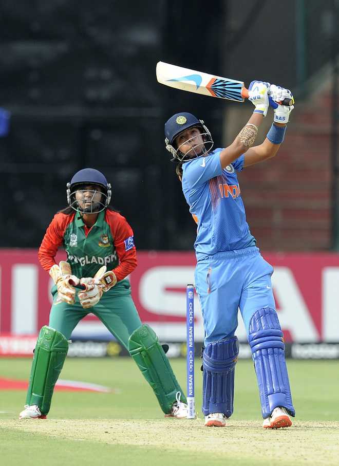 Big-hitting Harman takes India to big win in opener