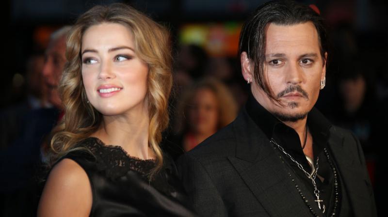 Amber Heard files for divorce from Johnny Depp after 15 months of marriage
