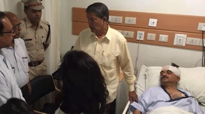 Harish Rawat visits injured BJP MP Tarun Vijay, says ‘God belongs to all’