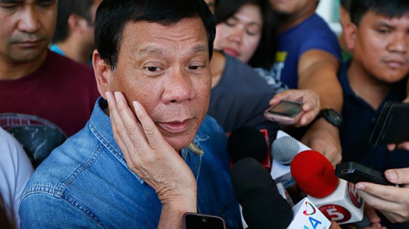 Philippines’ Duterte to visit Pope, apologise for ‘whore’ insult