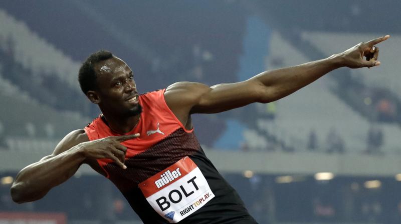 Bolt eases to victory, Harrison hurdles to glory