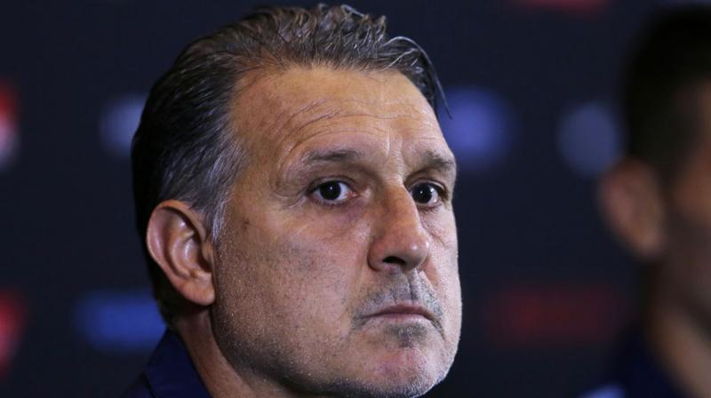 Argentina coach Martino joins Lionel Messi in quitting