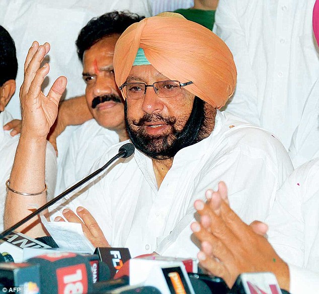Amarinder dares Badal to swear before Akal Takhat that he had not ordered land acquisition for SYL