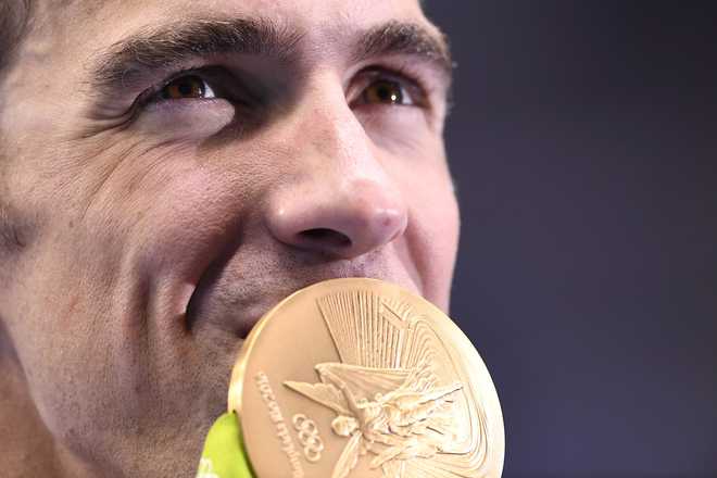 At 26 career Olympic medals, Phelps equals India’s record