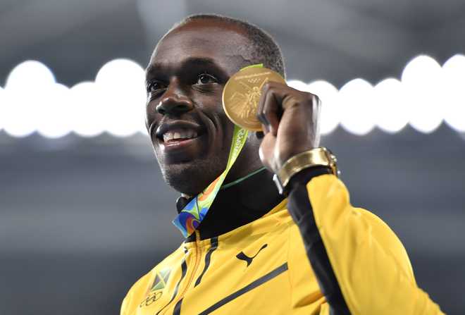 RIO OLYMPICS Bolt signs off with ‘triple-triple’ as Jamaica win relay race