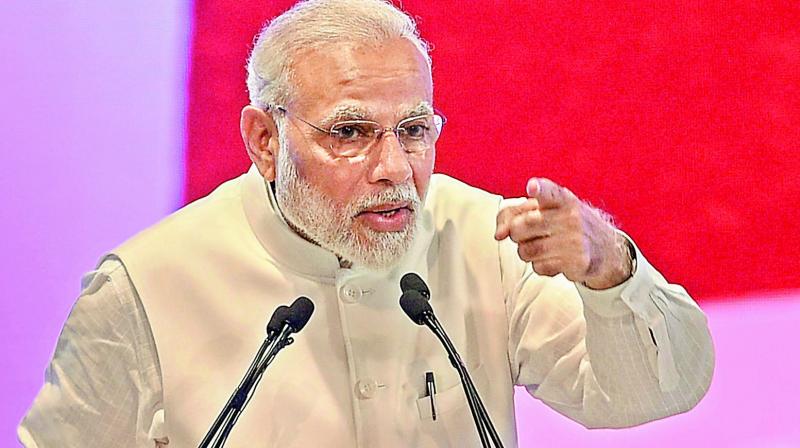 Won’t shy away from businessman, says PM Modi