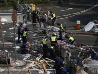 HK police use sledgehammers, chainsaws to clear protest barriers