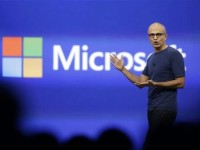 Microsoft sales beat Street hopes, shares rise