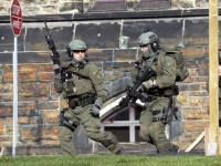 Canadian parliament in lockdown after shootings, gunman killed