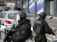 Paris post office gunman arrested after surrendering, hostages freed