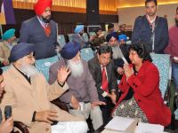 Badal announces review of policies for NRIs