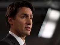 Trudeau says Harper pandering to fear of Muslims