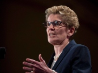 Ontario premier says Indiana law discriminates against gay couples