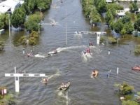 Central China flood toll jumps to 302