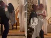 Groom tries to carry bride to their room on wedding day. Viral video shows things didn’t go well