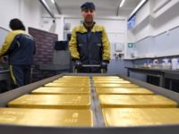 Gold retreats as dollar perks up ahead of U.S. jobs data