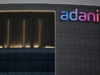 Adani Group slashes growth targets amid rout sparked by Hindenburg report